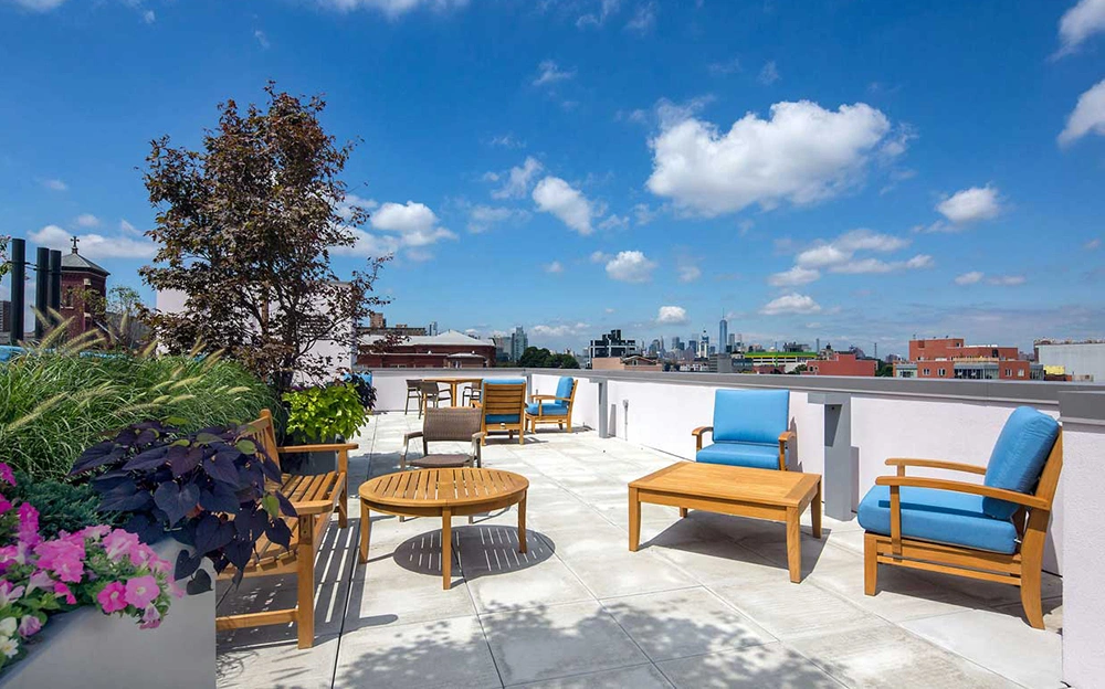 Exteria Lighting SP-7 solar bollards on the landscaped roof terrace of 180 Franklin in Brooklyn