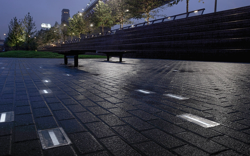 Exteria Lighting SH-180 solar LED paver lights embedded in the walkway of Race Street Pier, Philadelphia