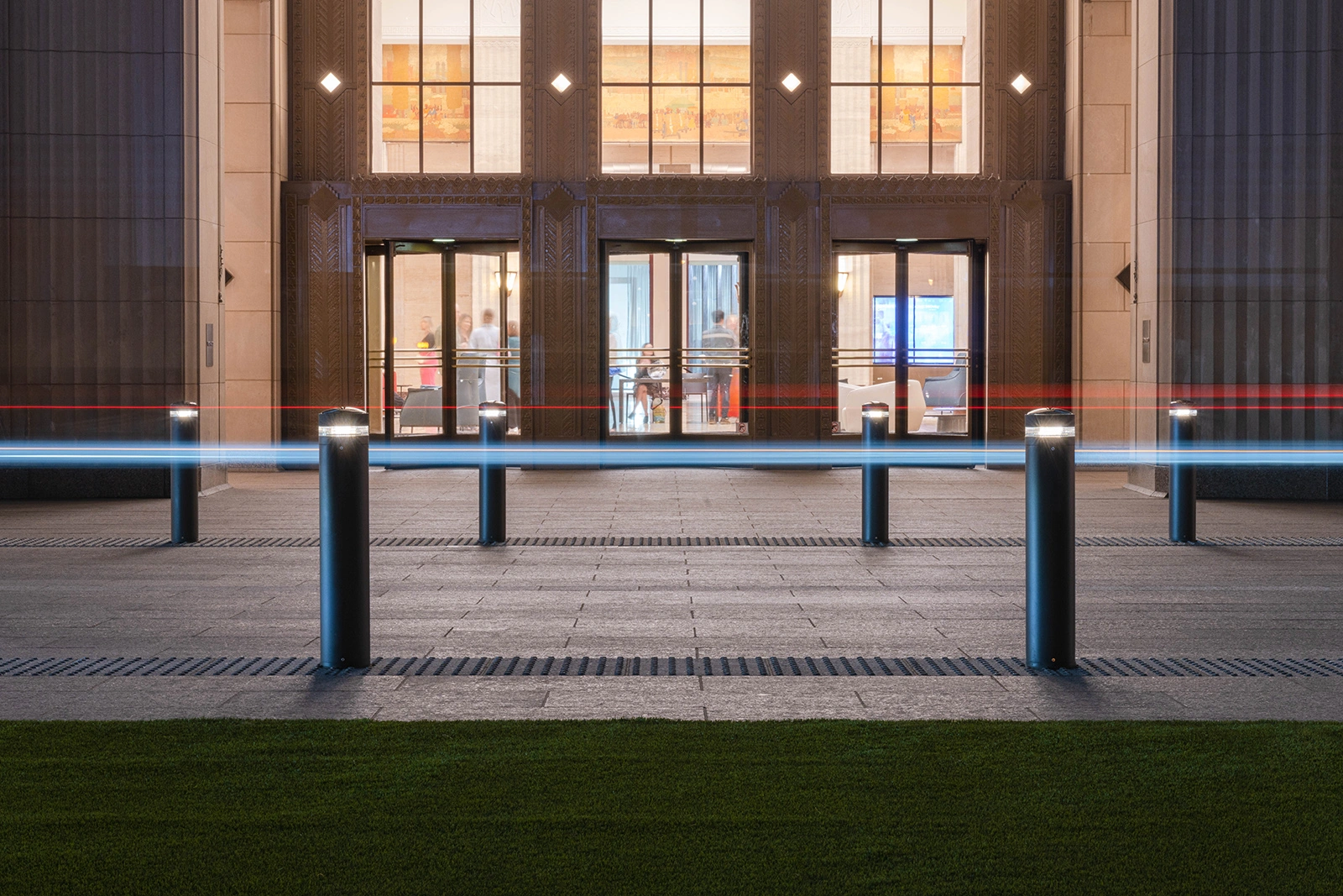 Exteria Lighting SP-010 solar LED bollards illuminating the pedestrian walkway at Merchandise Mart Plaza, Chicago