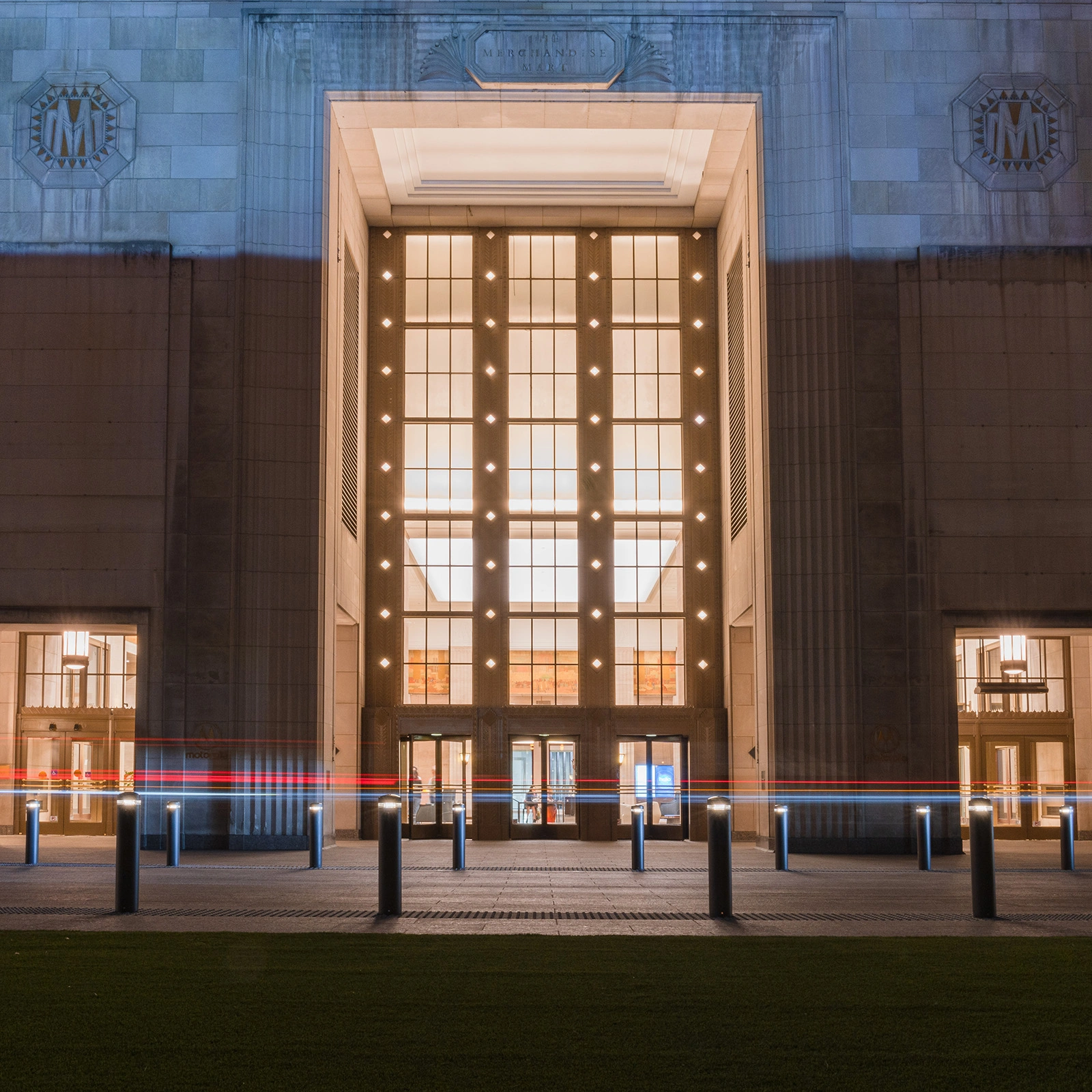 Exteria Lighting SP-010 solar LED bollards illuminating the pedestrian walkway at Merchandise Mart Plaza, Chicago