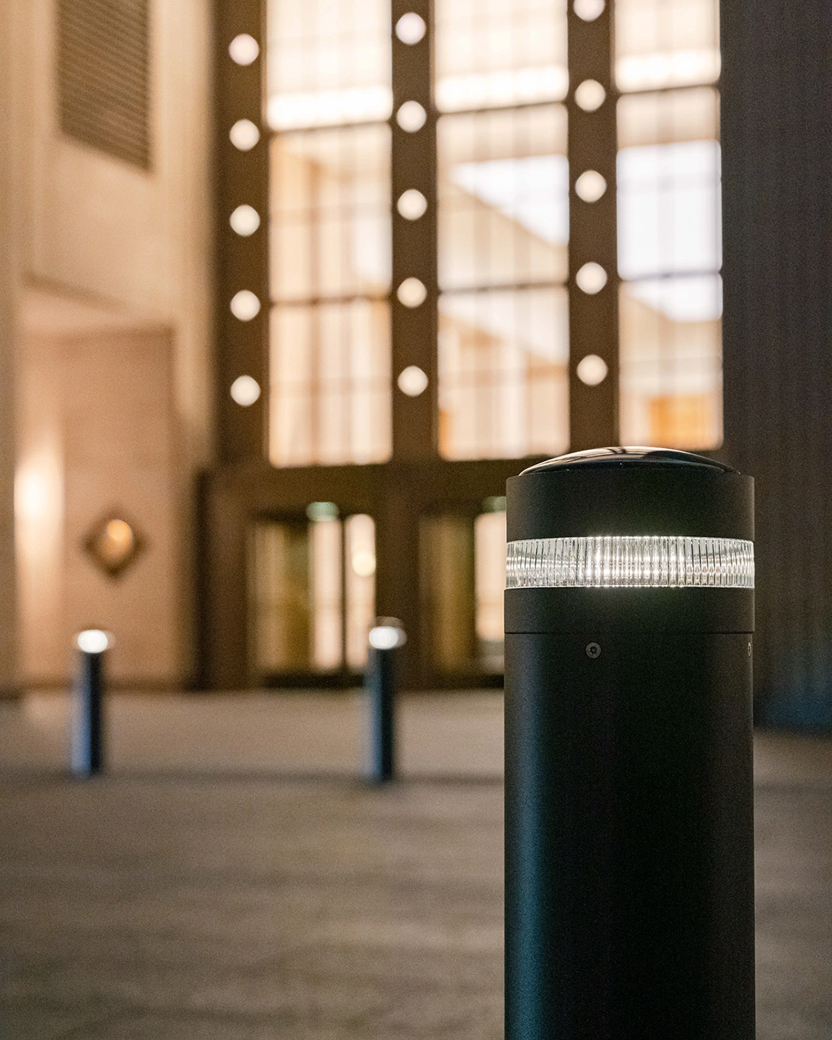 Exteria Lighting SP-010 solar LED bollards illuminating the pedestrian walkway at Merchandise Mart Plaza, Chicago
